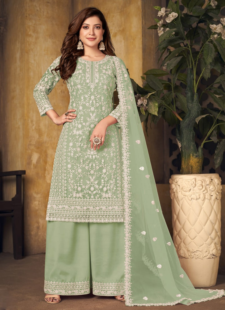 Lassya Fahion Pista Green Textured Beauty Designer Net and Santoon Palazzo Suit