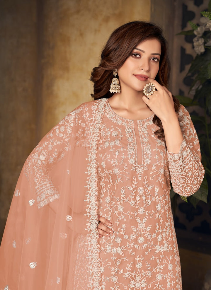 Lassya Fahion Peach Orange Textured Beauty Designer Net and Santoon Palazzo Suit