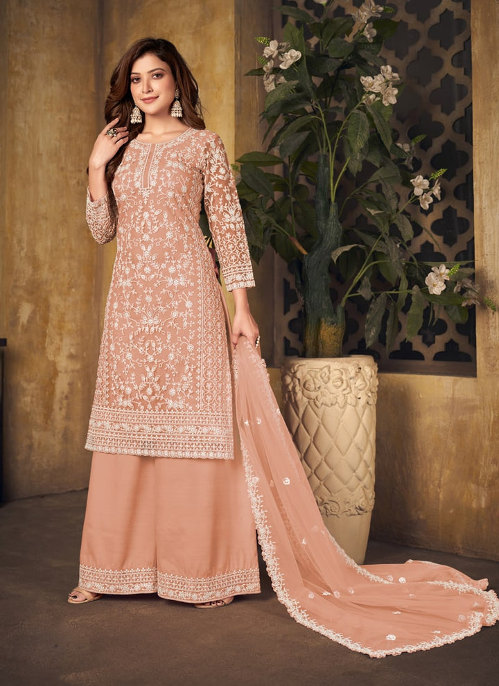 Lassya Fahion Peach Orange Textured Beauty Designer Net and Santoon Palazzo Suit