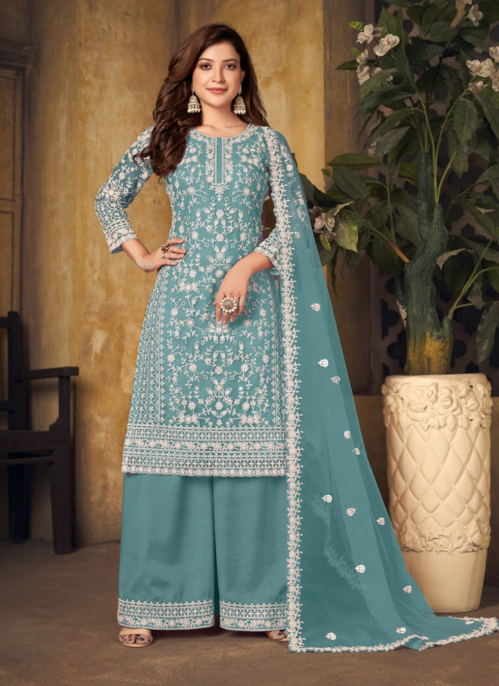 Lassya Fahion Sky Blue Textured Beauty Designer Net and Santoon Palazzo Suit