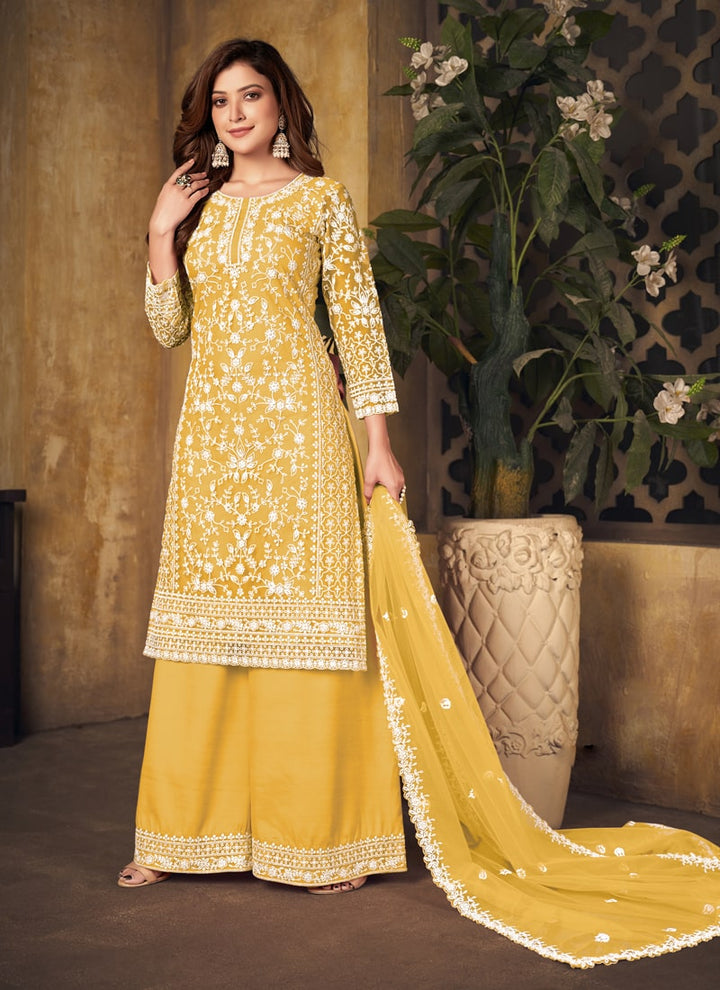 Lassya Fahion Yellow Textured Beauty Designer Net and Santoon Palazzo Suit