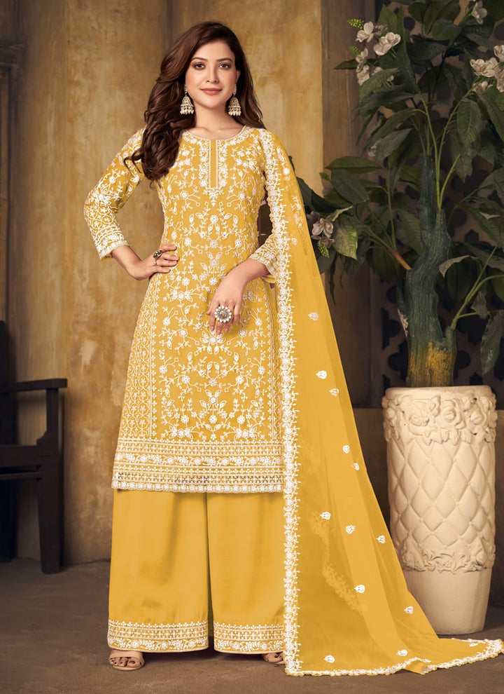 Lassya Fahion Yellow Textured Beauty Designer Net and Santoon Palazzo Suit