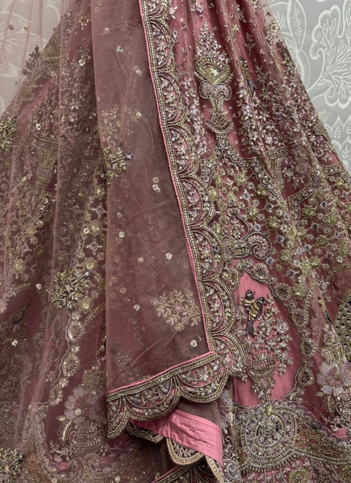 Lassya Fashion Mauve Pink Exquisite Heavy Net Wedding Lehenga with Zari and Sequins