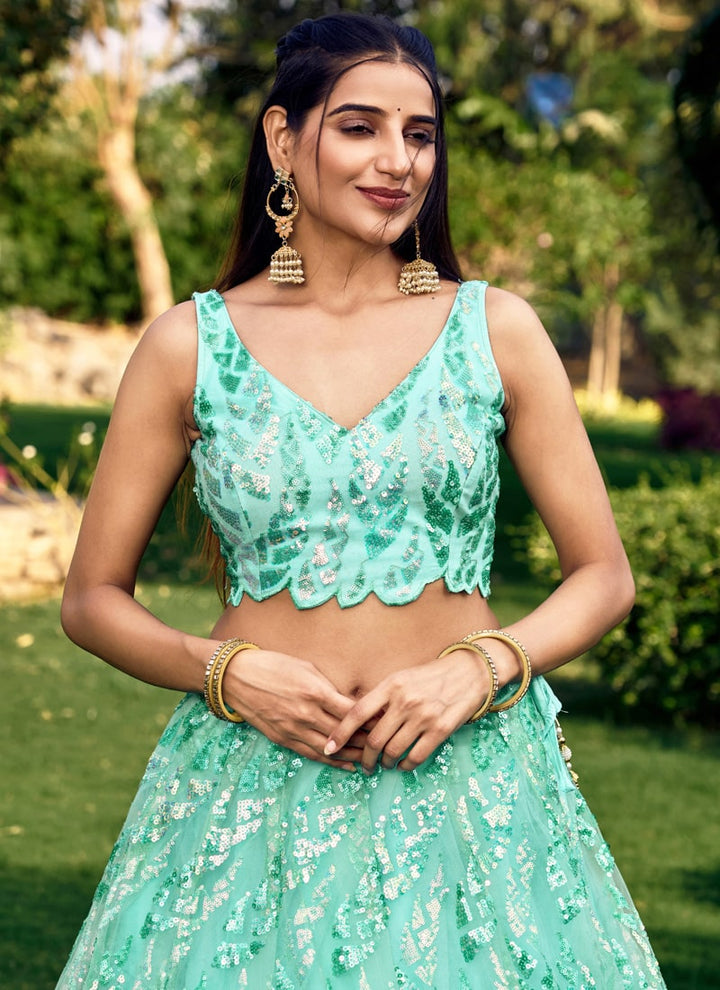 Lassya Fashion Sea Green Shimmering Engagement Lehenga in Soft Net