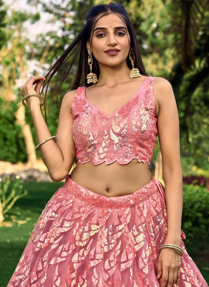 Lassya Fashion Pink Shimmering Engagement Lehenga in Soft Net