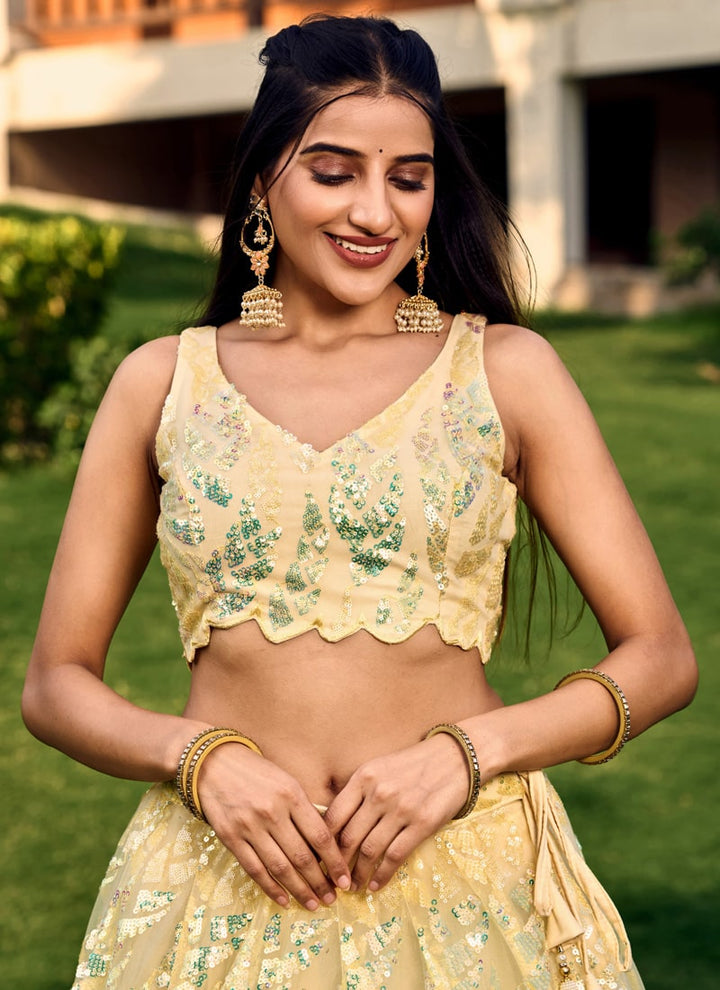 Lassya Fashion Light Yellow Shimmering Engagement Lehenga in Soft Net