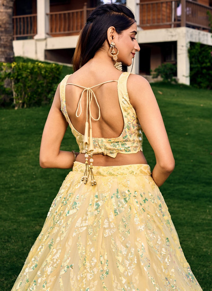 Lassya Fashion Light Yellow Shimmering Engagement Lehenga in Soft Net