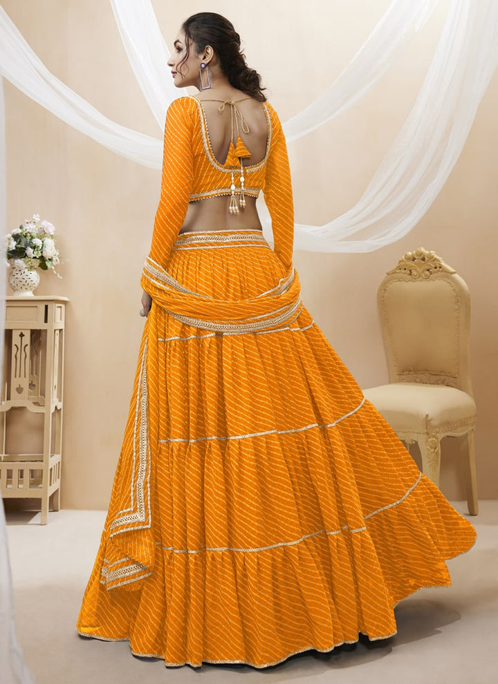 lassya Fashion Orange Engagement Lehenga with Georgette Leheriya Print