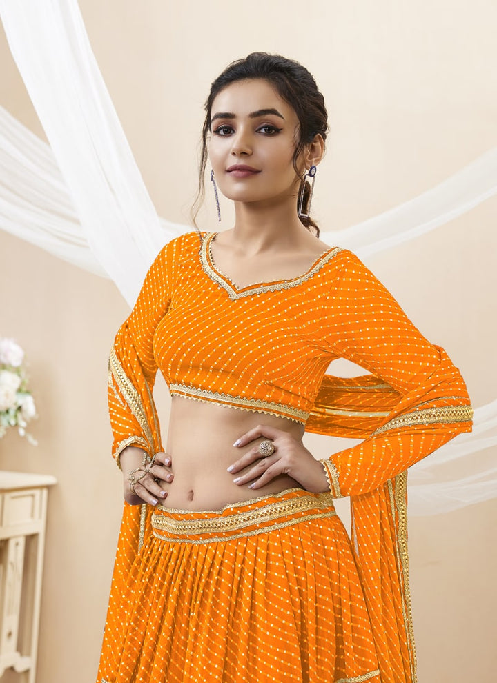 lassya Fashion Orange Engagement Lehenga with Georgette Leheriya Print