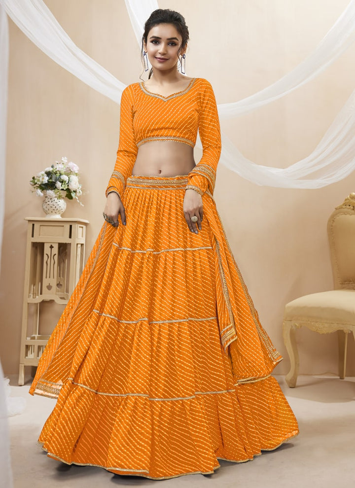 lassya Fashion Orange Engagement Lehenga with Georgette Leheriya Print