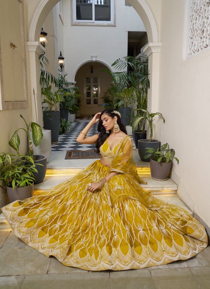 Lassya Fashion Mustard Yellow Elegant Engagement Lehenga with Embroidery