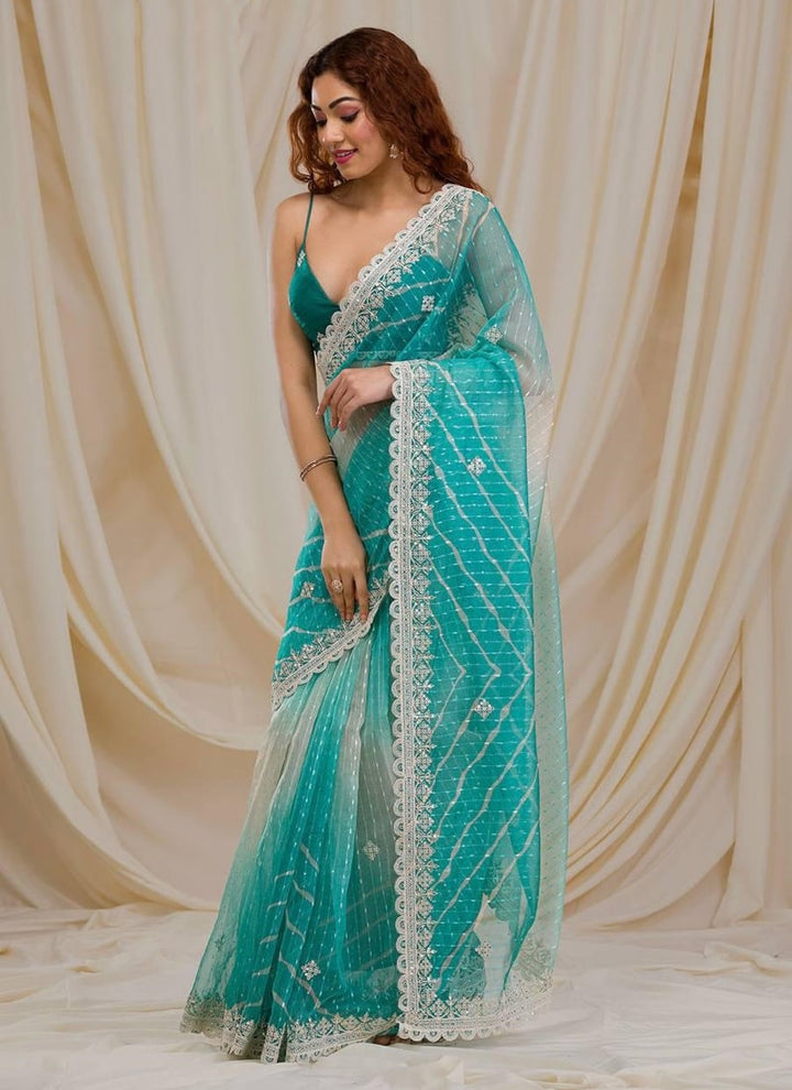Lassya Fashion Green Exquisite Georgette Saree with Intricate Embroidery and Sequins Work