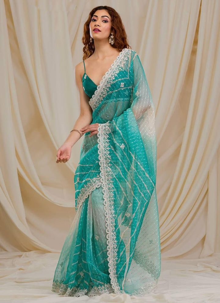 Lassya Fashion Green Exquisite Georgette Saree with Intricate Embroidery and Sequins Work
