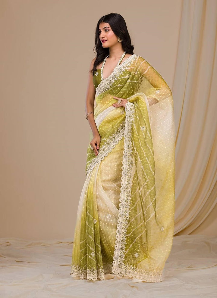 Lassya Fashion Mehendi Green Exquisite Georgette Saree with Intricate Embroidery and Sequins Work