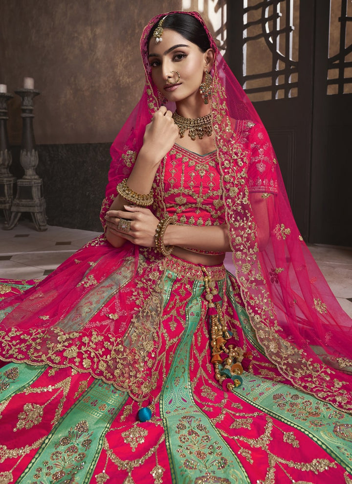 Lassya Fashion Pink And Green Exquisite Banarasi Silk Wedding Lehenga Ensemble
