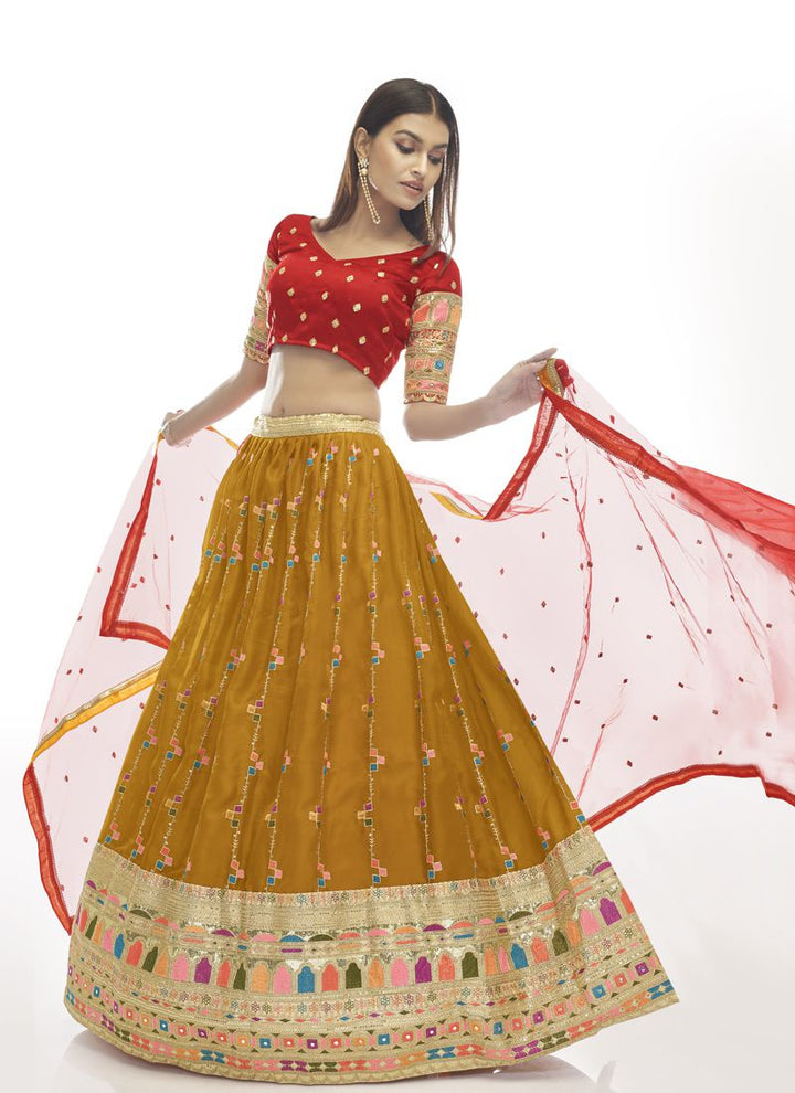 Musterd Yellow and Red Partywear Designer Lehenga With Georgette Fancy Dupatta.