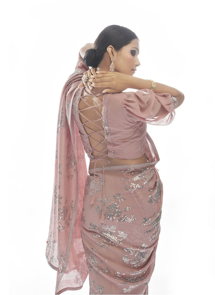 Peach Embellished Sequinned Georgette Saree With Blouse.
