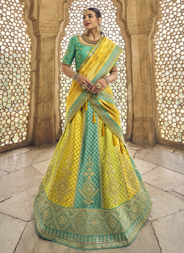 Yellow And Sea Green Wedding Special Designer Banarasi Silk Lehenga Choli