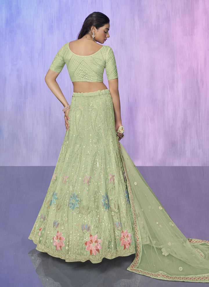 Lassya Fashion Pista Green Embroidered Net Wedding Lehenga Choli Set with Timeless Appeal