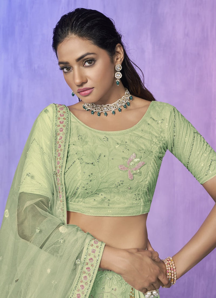 Lassya Fashion Pista Green Embroidered Net Wedding Lehenga Choli Set with Timeless Appeal