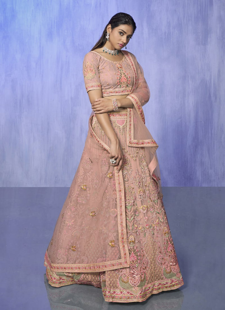Lassya Fashion Peach Pink Exquisite Embroidered Net Lehenga Choli Ensemble for Weddings