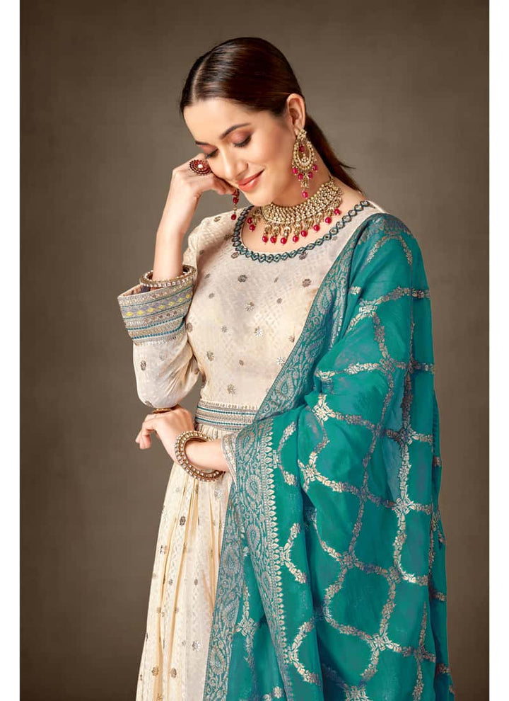 Turquoise Green Asymmetrical Salwar Suit in Tissue Silk and Viscose Jacquard