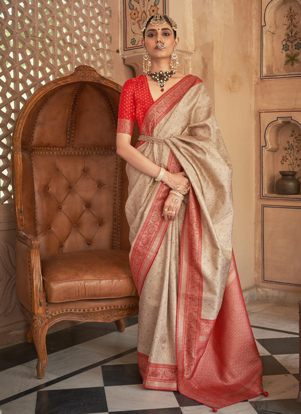 Beige and Orange Exquisite Handloom Patola Silk Saree with Matching Blouse