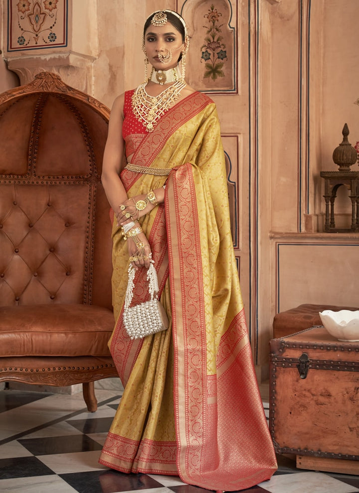 Mustard Yellow and Red Exquisite Handloom Patola Silk Saree with Matching Blouse