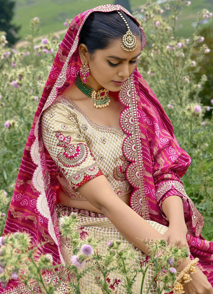 lassya Fashion Cream And Magenta Pink Enchanting Embroidered Lehenga Choli in Fancy Silk
