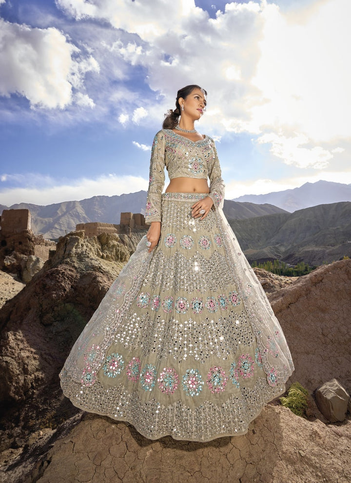 Lassya Fashion Cream Elegant Pure Organza Lehenga Choli with Mirror and Zarkan Embellishments