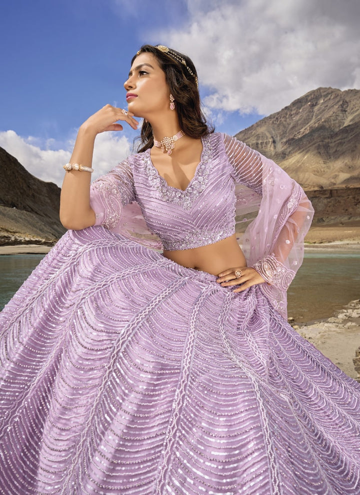 Lassya Fashion Lavender Regal Pure Net Lehenga Choli with Mirror And Zarkan Embellishments