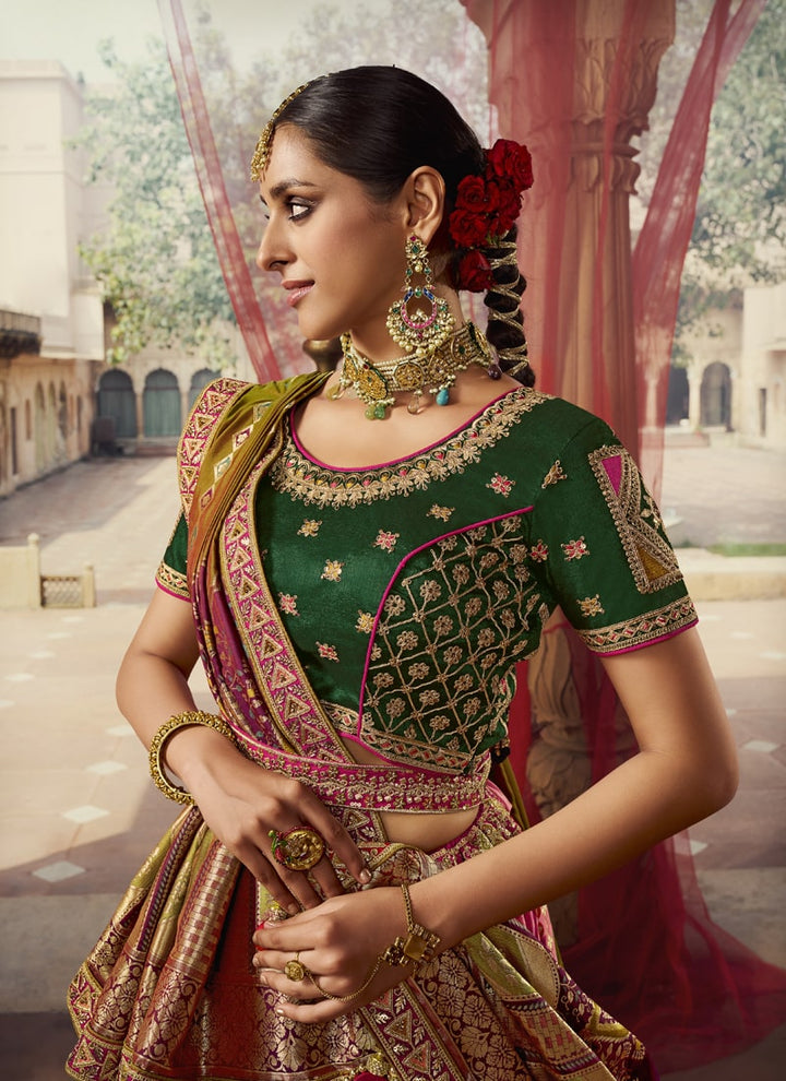 Lassya fashion's Magenta Pink And Green Exquisite Banarasi Silk Wedding Lehenga Choli