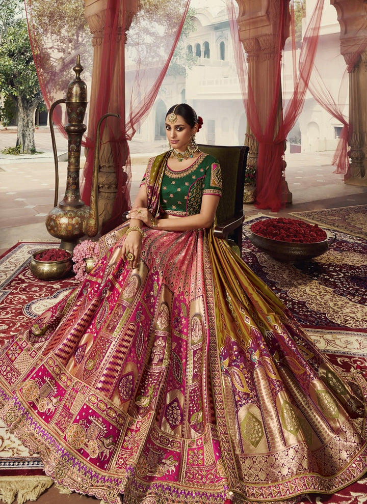 Lassya fashion's Magenta Pink And Green Exquisite Banarasi Silk Wedding Lehenga Choli