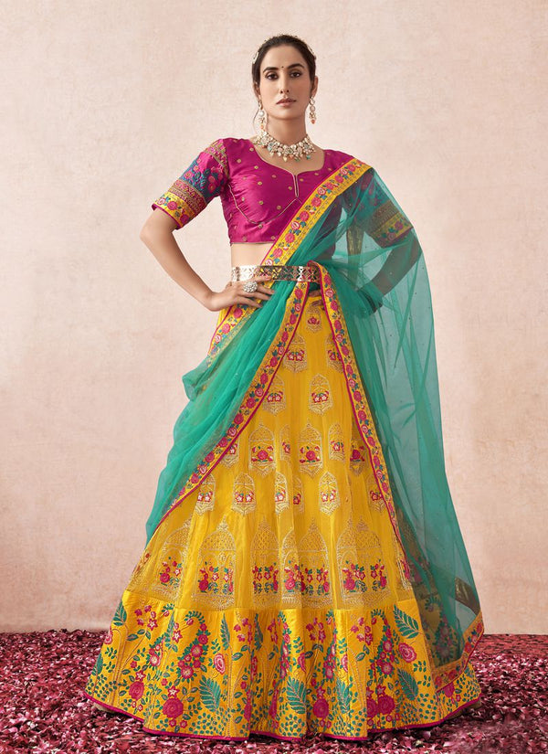 Butter Yellow And Magenta Color Heavy Net With Banglory Silk Lehenga Choli