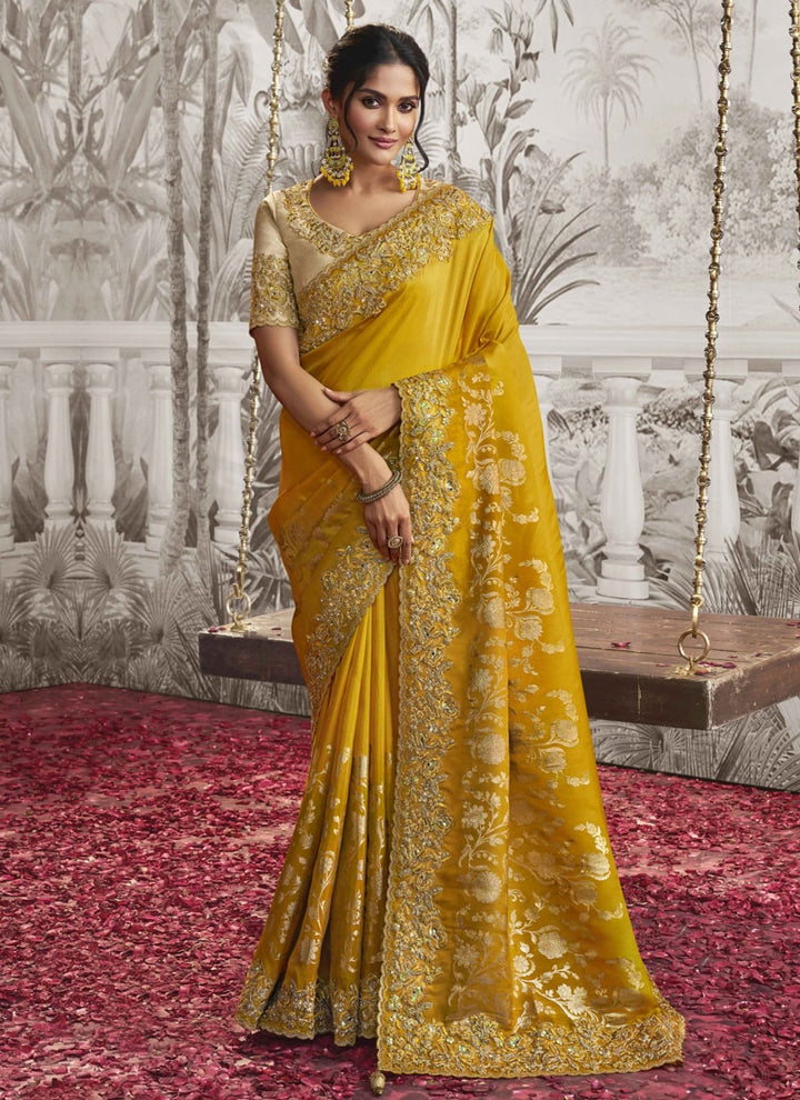 Lassya fashion Sunrise Yellow Exquisite Wedding Wear Saree with Zari Embroidery