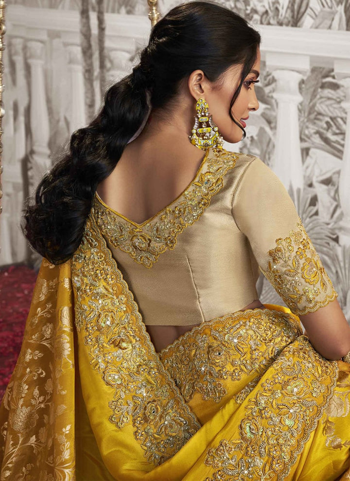 Lassya fashion Sunrise Yellow Exquisite Wedding Wear Saree with Zari Embroidery