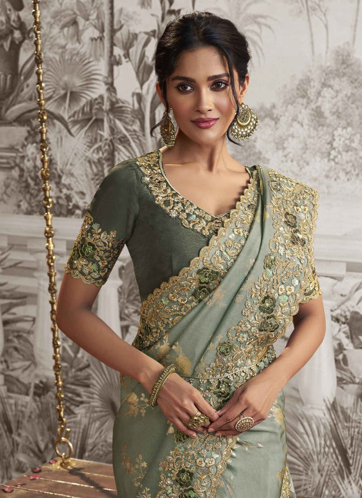 Lassya fashion Dusty Green Exquisite Wedding Wear Saree with Zari Embroidery