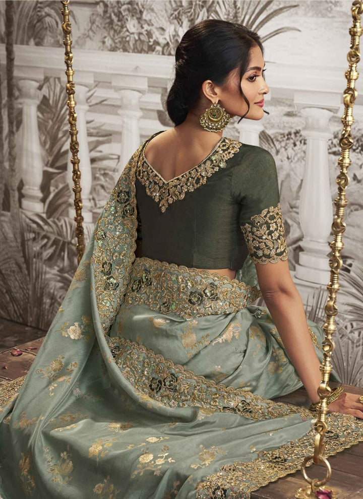 Lassya fashion Dusty Green Exquisite Wedding Wear Saree with Zari Embroidery