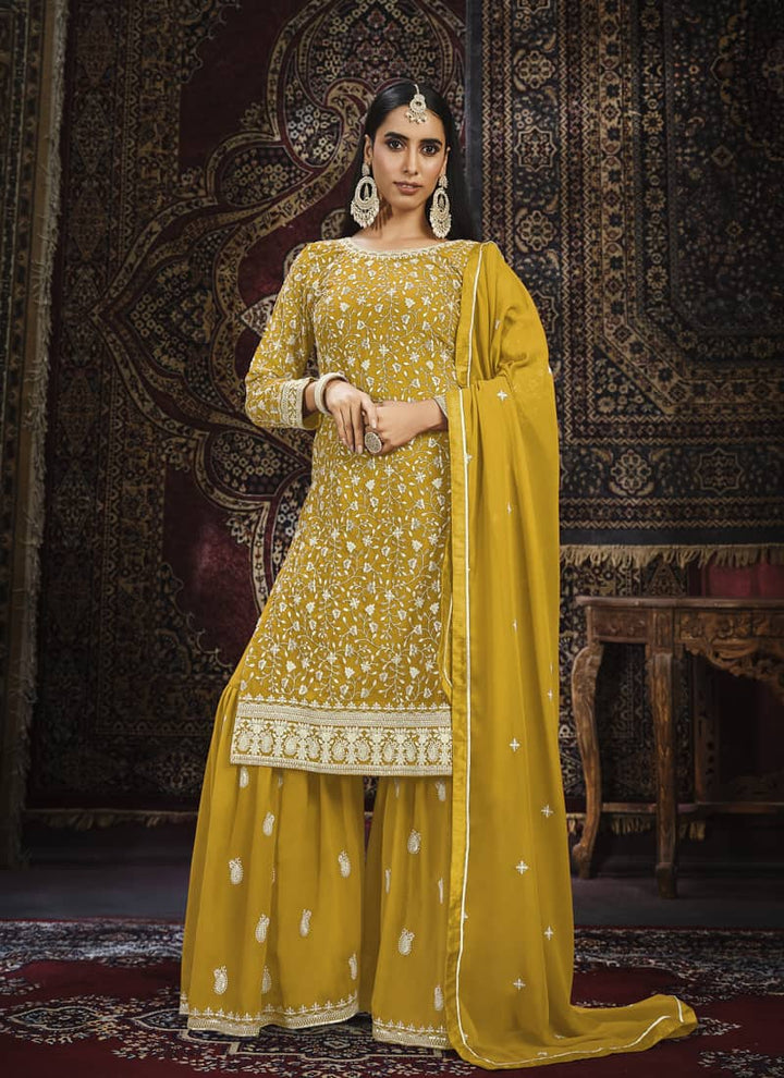 Lassya Fashion Mustard Yellow Exquisite Faux Georgette Gharara Suit Set with Intricate Embroidery