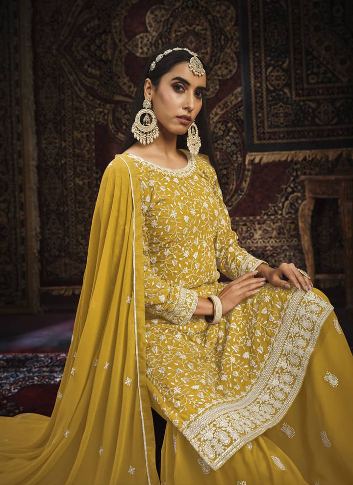 Lassya Fashion Mustard Yellow Exquisite Faux Georgette Gharara Suit Set with Intricate Embroidery