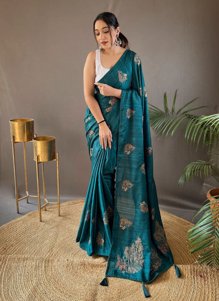 Lassya Fashion Teal green Innovative Zari Embroidery Silk Saree with Butti Blouse Design
